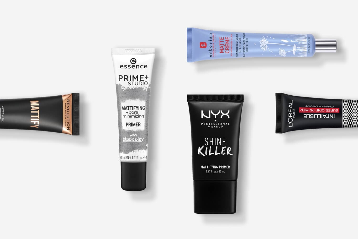 Makeup Revolution Mattify, essence Prime+ Studio, Erborian Matte Crème, NYX Shine Killer and L'Oréal Infaillible Super Grip primer tubes on grey.