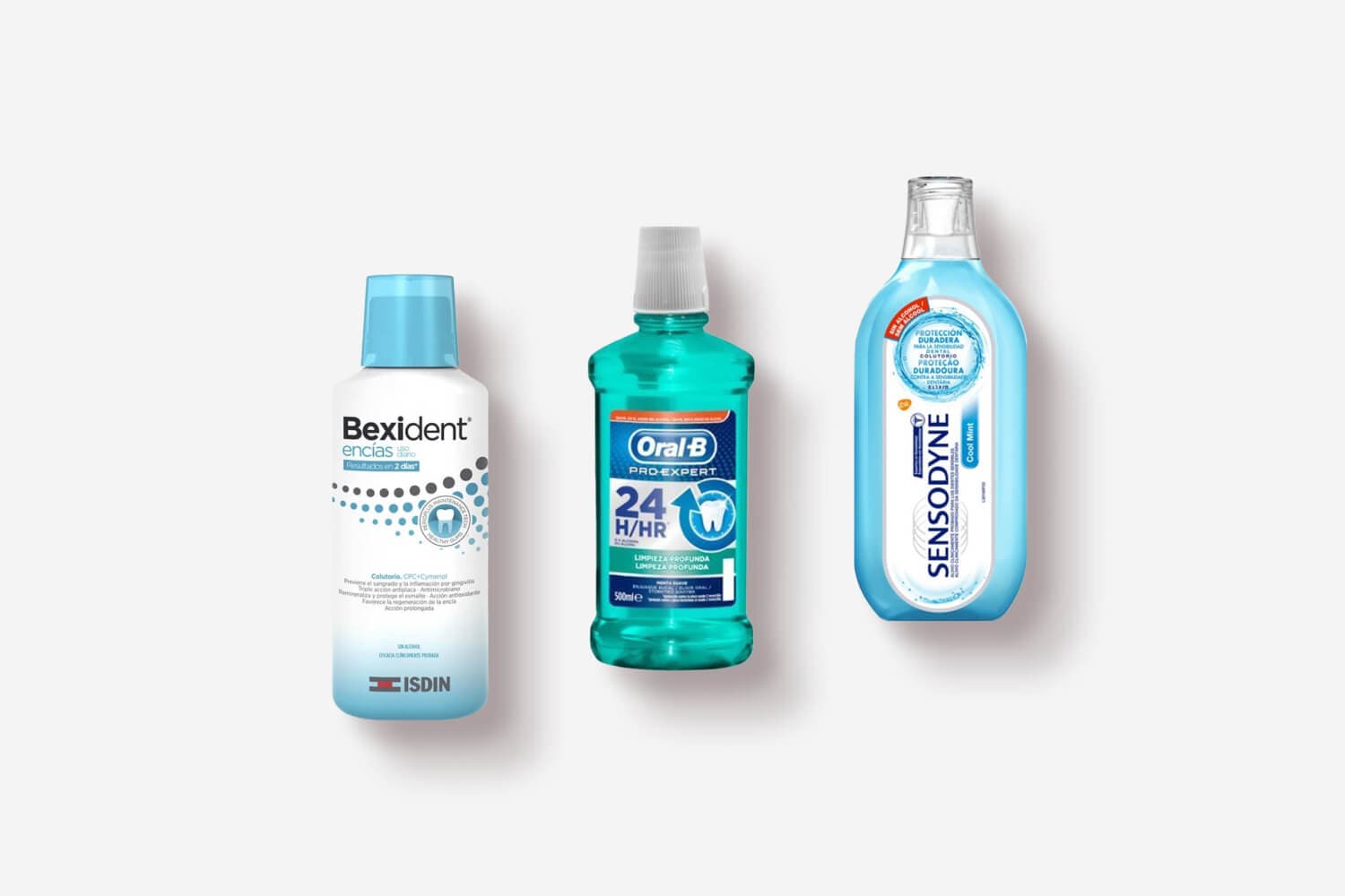 Isdin Bexident Encías, Oral-B Pro-Expert 24H Limpieza Profunda and Sensodyne Cool Mint mouthwash bottles on grey.