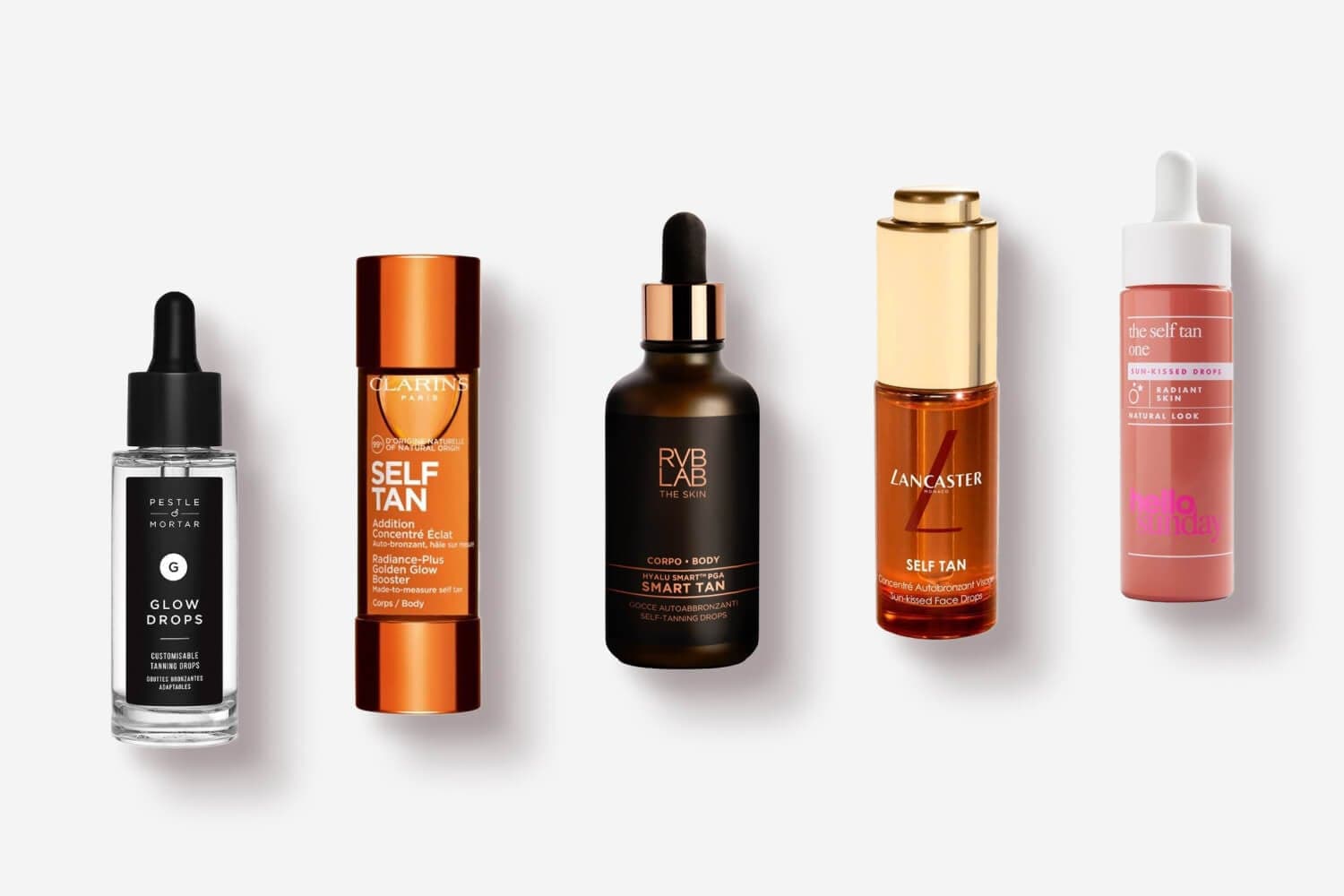 Pestle & Mortar Glow Drops, Clarins Self Tan Booster, RVB Lab Smart Tan, Lancaster Self Tan drops and Hello Sunday The Self Tan One in a row.