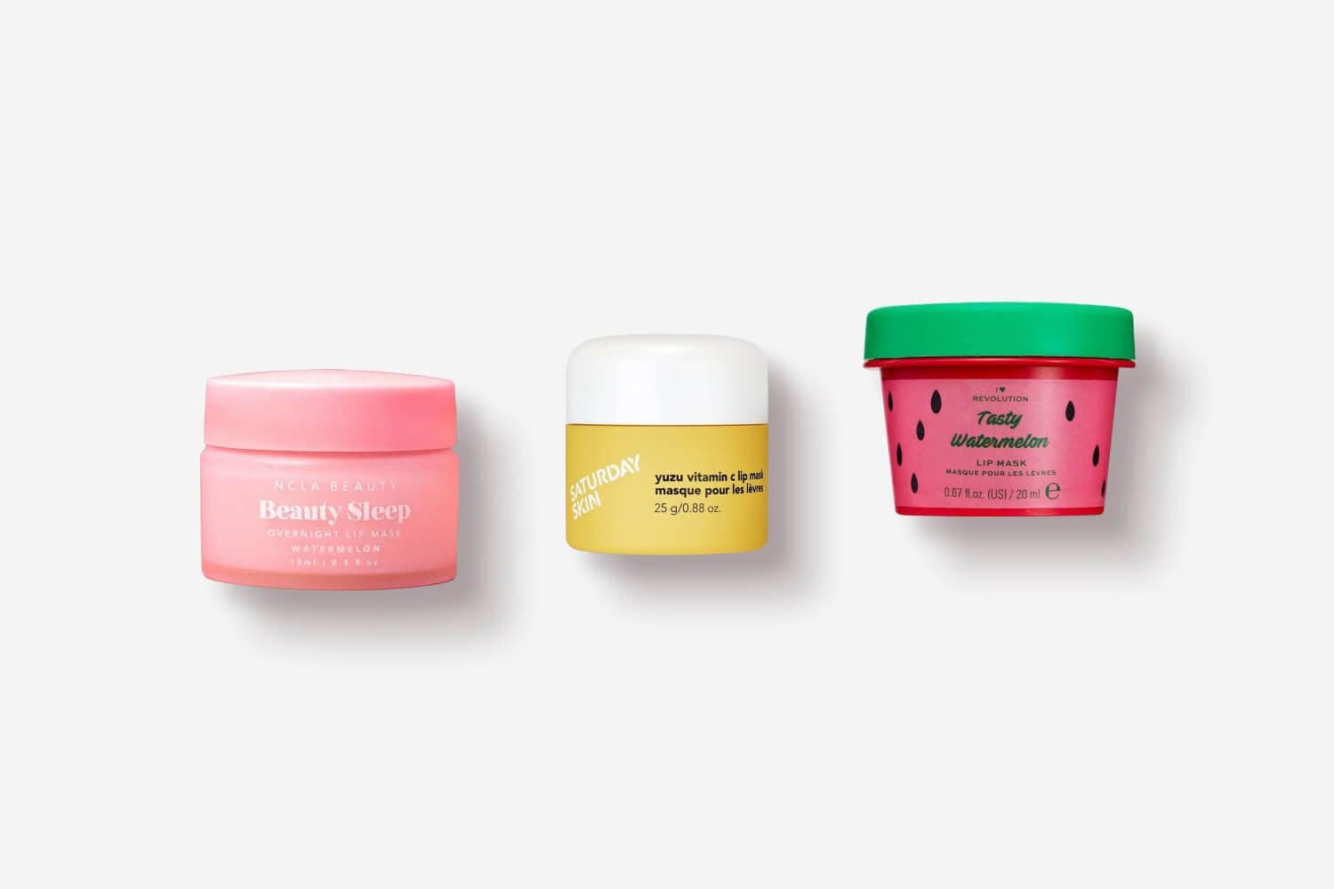 Three lip mask pots on white: NCLA Beauty Beauty Sleep Watermelon, Saturday Skin Yuzu Vitamin C and I Heart Revolution Tasty Watermelon.